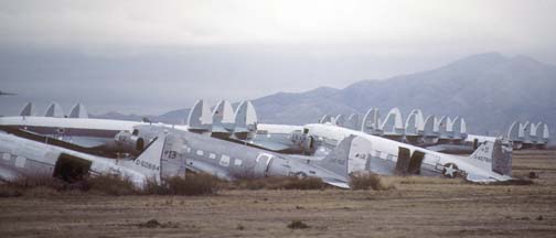 C-47Bs, 45-0894 (c/n 16897),  43-16156 (c/n 20622), and 43-49786 (c/n 27047), MASDC, December 19, 1984