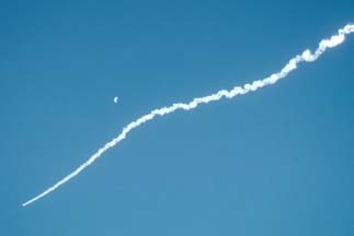 Delta-II flies past the moon on December 7, 2001
