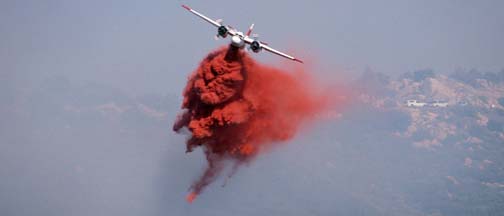 Tankers fight the Camino Fire on the crest of the Santa Ynez Mountains, August 15, 2002
