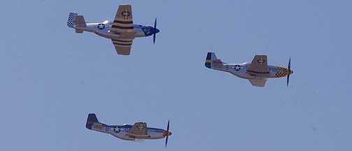 North American P-51D Mustang NL7TF Double Trouble Two, N327DB Lady Jo, and NL7715C Wee Willy II