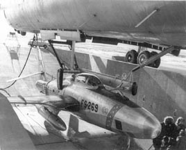 FICON RBF-84F 52-7269 is lowered from the bomb bay of GRB-36D, 49-2696 at Fairchild AFB, Washington in December 1955
